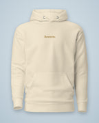 Sweat à capuche heaven. crème, broderie fil doré sur la poitrine, vu de face