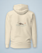 Dos du sweat heaven. : cheval au galop dans les vagues sous un soleil corail
