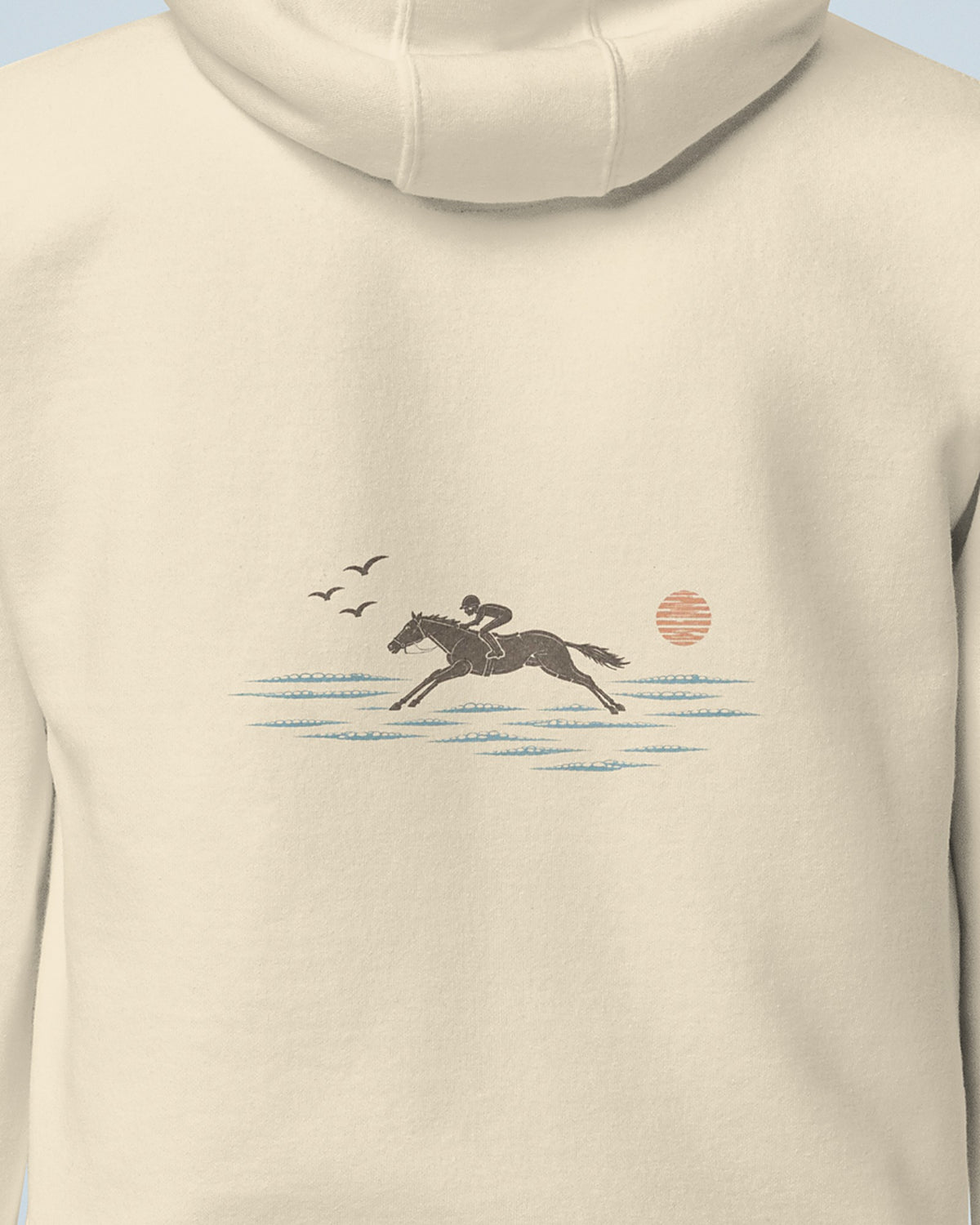 Gros plan sur l'illustration du dos : cavalier au galop face à la mer